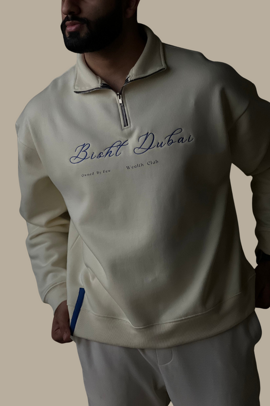 THE BISHT DUBAI QUARTER-ZIP SWEATER (CREAM & NAVY)