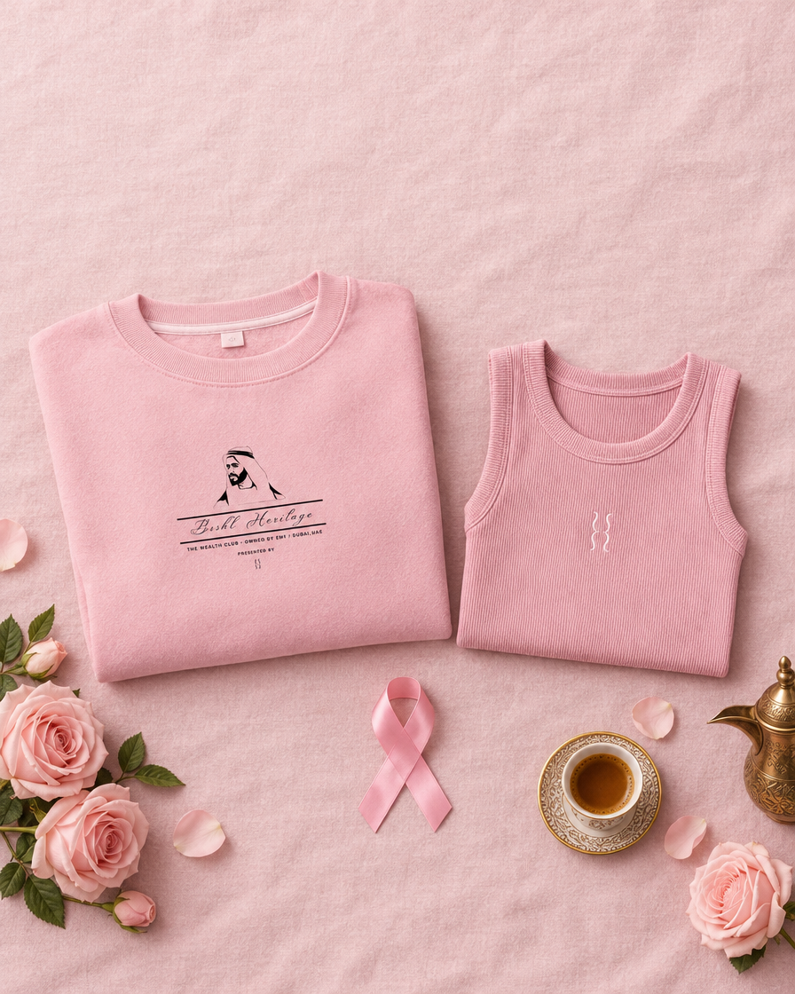 Pink October Bundle flat lay: pink Sheikh Zayed sweater and pink tank top with pink ribbon